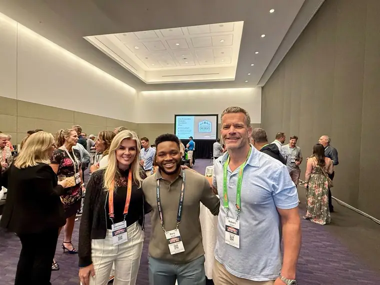With franchise owners at the convention mixer